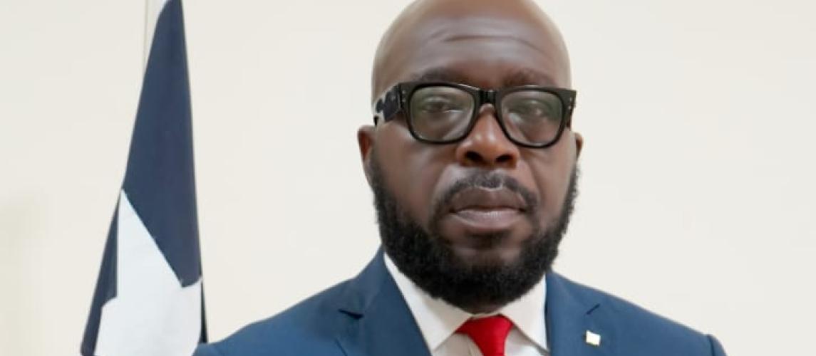 Deputy Minister Armah Urges Stranded Liberians to Return Home